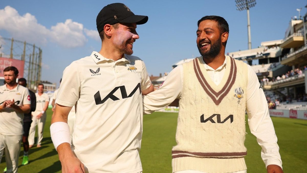 Rory Burns and Ryan Patel celebrate after securing a win over Durham which helped them to win the 2024 County Championship