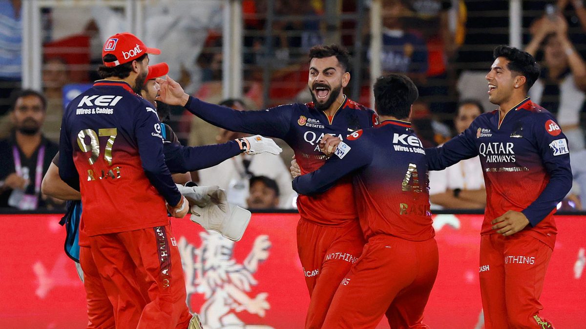 Virat Kohli of Royal Challengers Bengaluru celebrates winning with teammates after the 2025 IPL Final match between Royal Challengers Bengaluru and Punjab Kings at Narendra Modi Stadium on June 03, 2025, in Ahmedabad, India