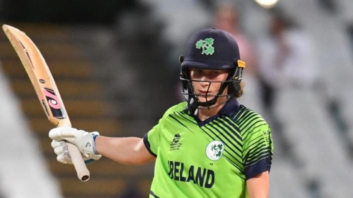 Orla Prendergast raises her bat after reaching fifty