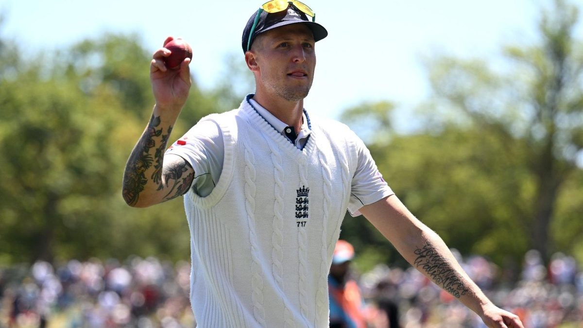Brydon Carse raises the ball as he leaves the field following his maiden Test ten-wicket match haul