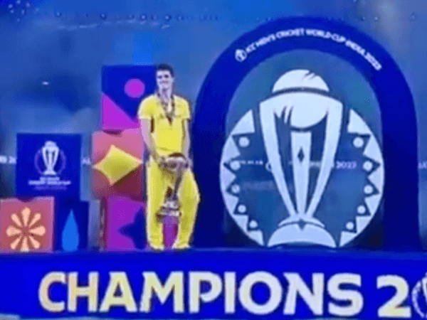 most-awkward-presentation-of-all-time-pat-cummins-left-standing-with-world-cup-by-himself-before-trophy-lift.Click to read full article.