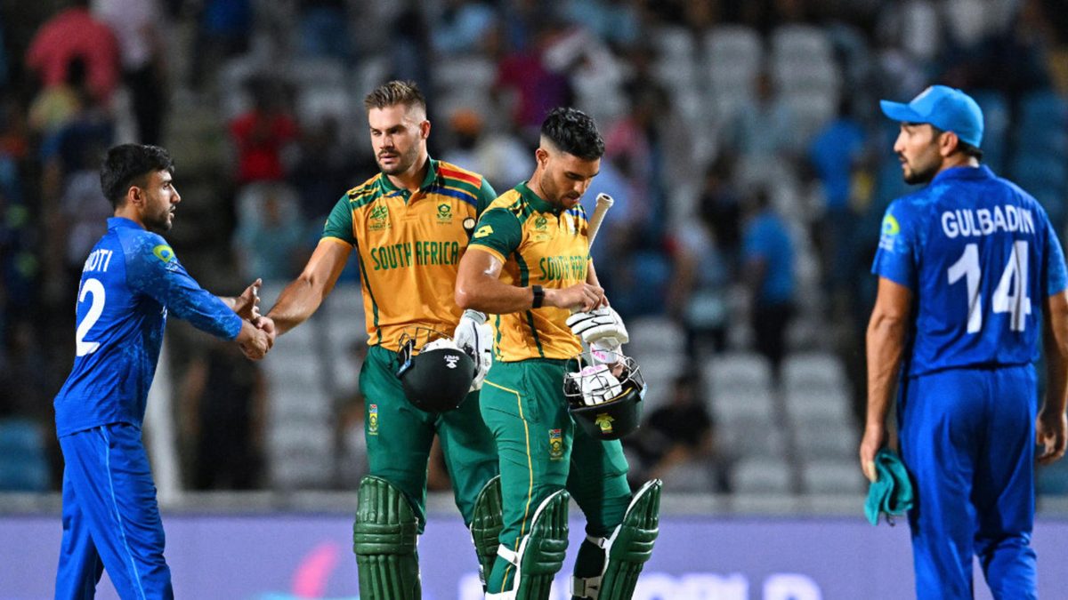 South Africa's players greets Afghanistan's players after South Africa's victory in the ICC men's Twenty20 World Cup 2024 semi-final