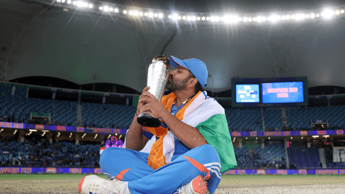 Rohit Sharma kisses the Champions Trophy after winning the final
