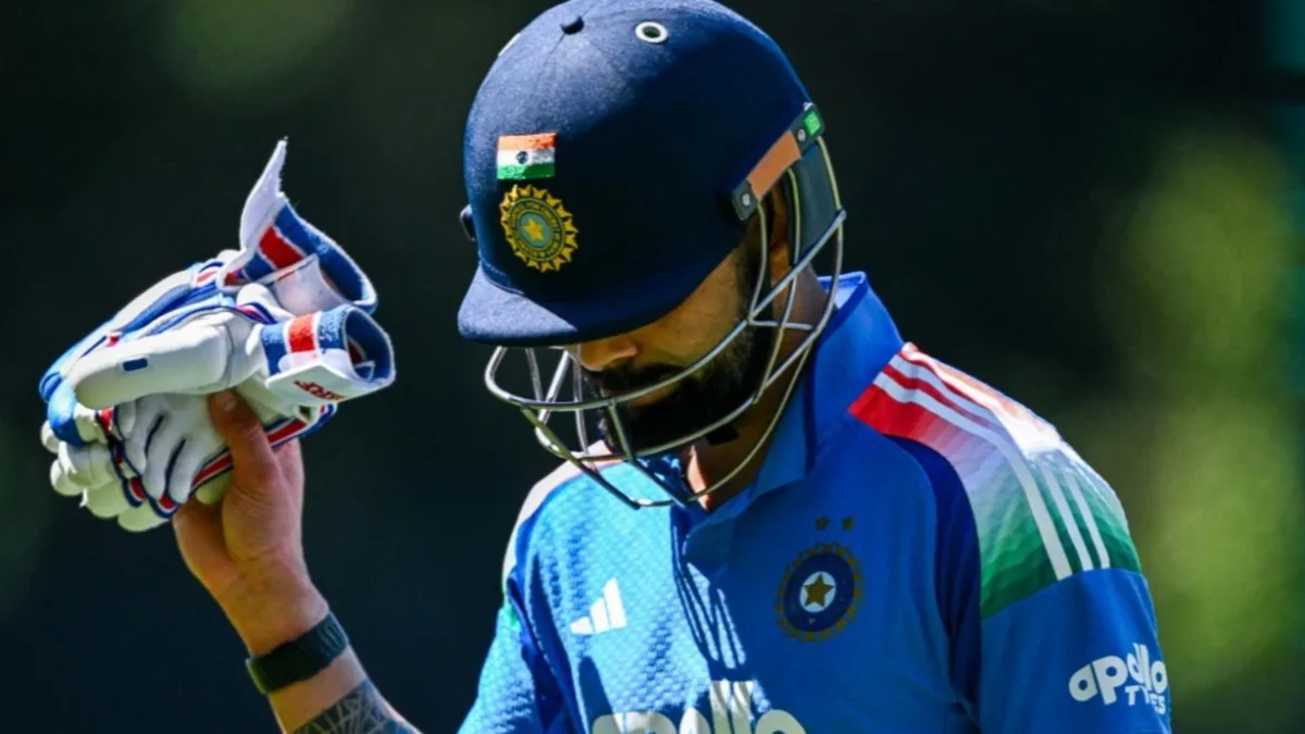 Virat Kohli walks back after his duck v Australia