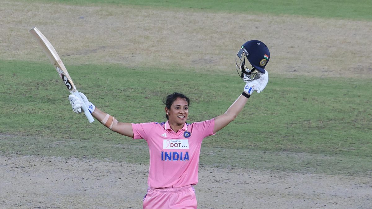 Smriti Mandhana of India celebrates after scoring a hundred during game three of the One Day International series between India and Australia at Arun Jaitley Stadium on September 20, 2025 in Delhi, India