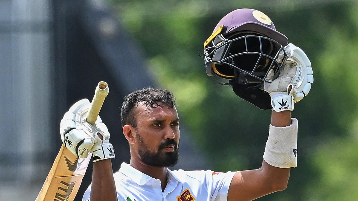 Sri Lanka Cricket President's XI Oshada Fernando celebrates after scoring a century (100 runs) during the first day of the two-day warm-up match between Pakistan and Sri Lanka Cricket President's XI at the Mahinda Rajapaksa International Cricket Stadium in Hambantota on July 11, 2023