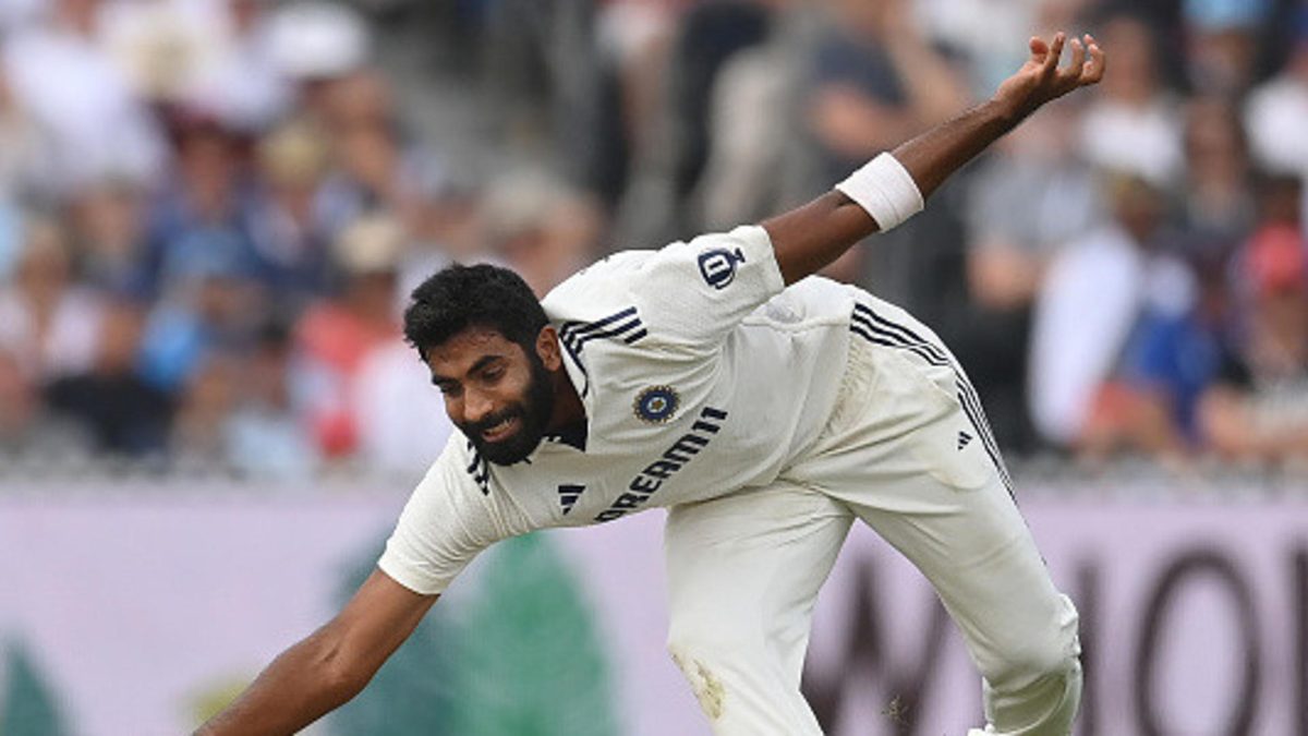 Jasprit Bumrah of India attempts to stop the ball during the second day of the 4th Rothesay Test match between England and India at Emirates Old Trafford on July 24, 2025 in Manchester, England