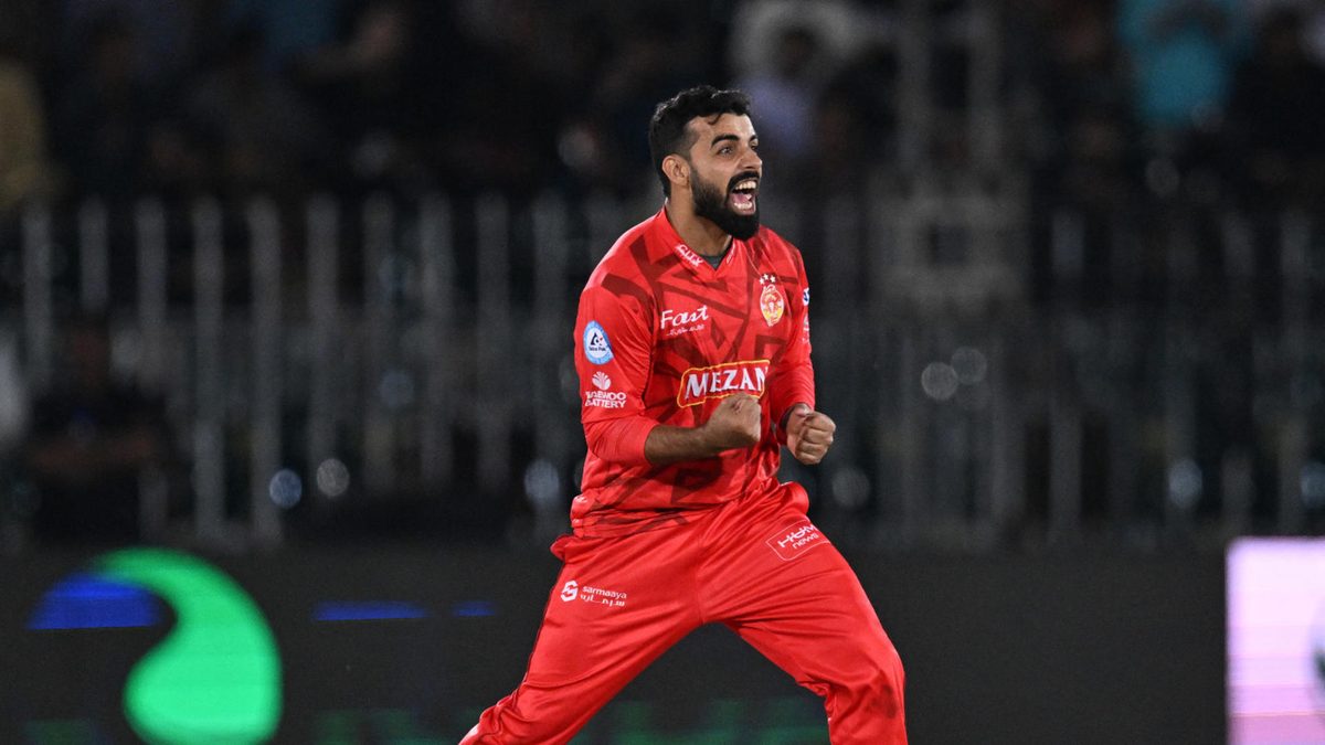 Islamabad United's Shadab Khan celebrates the wicket of Lahore Qalandars' Sam Billings during the Pakistan Super League (PSL) Twenty20 cricket match between Islamabad United and Lahore Qalandars' at the Rawalpindi Cricket Stadium in Rawalpindi on April 11, 2025