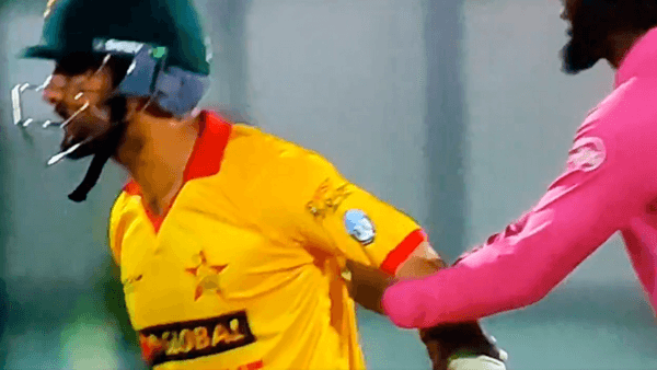 sikandar-raza-banned-after-umpire-holds-him-back-during-spat-with-ireland-players.Click to read full article.