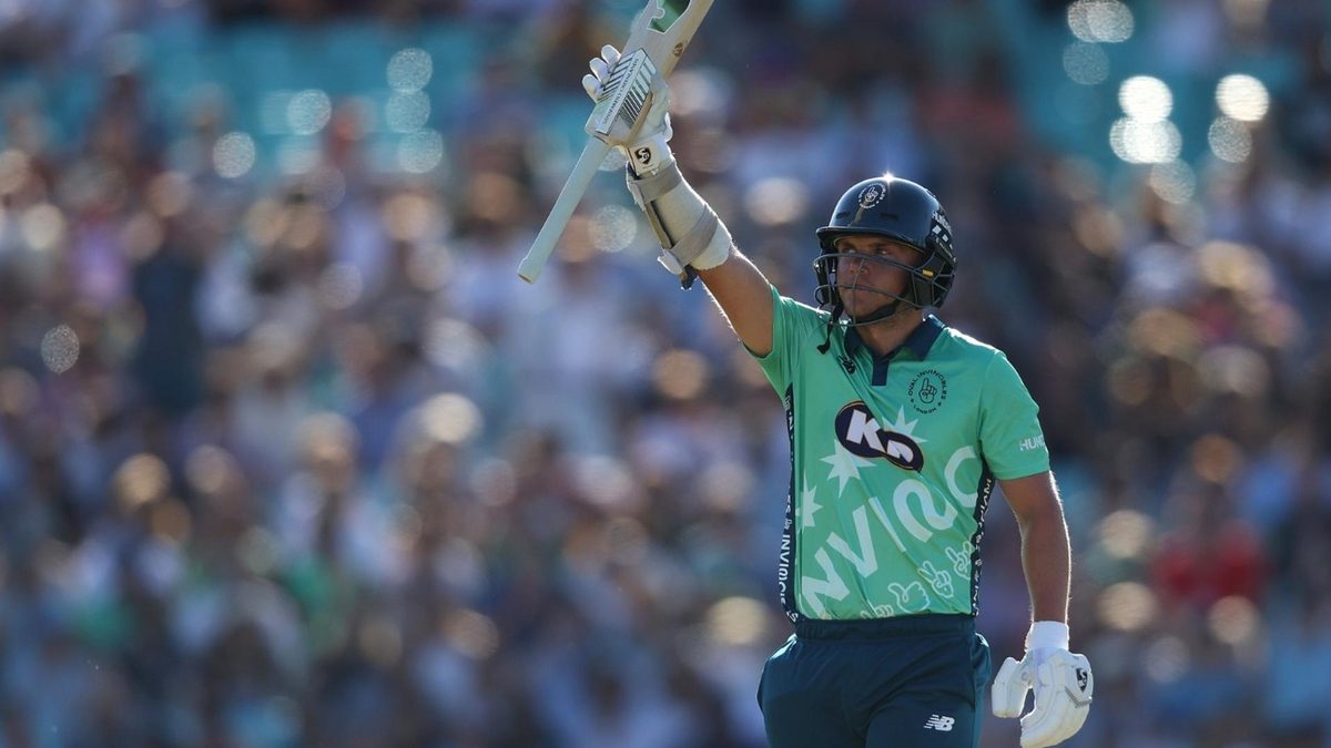 Sam Curran raises his bat to celebrate an innings during The Hundred
