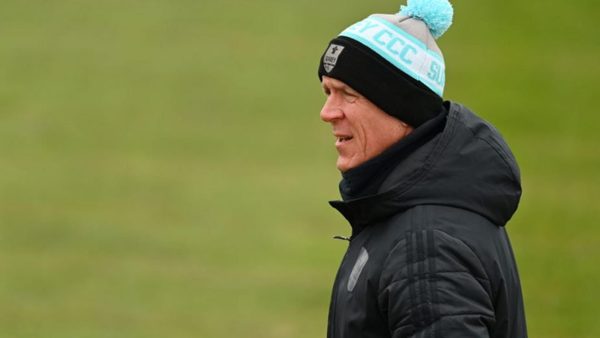 alec-stewart-stands-in-as-square-leg-umpire-in-county-championship-fixture.Click to read full article.