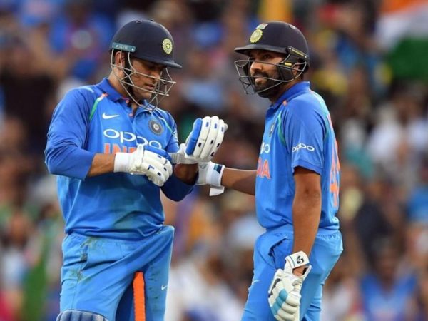 happy-dhoni-bats-four-rohit.Click to read full article.