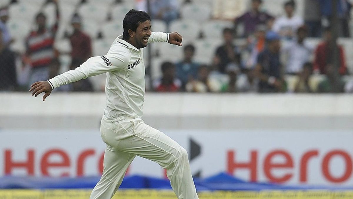 Pragyan Ojha celebrates a wicket for India