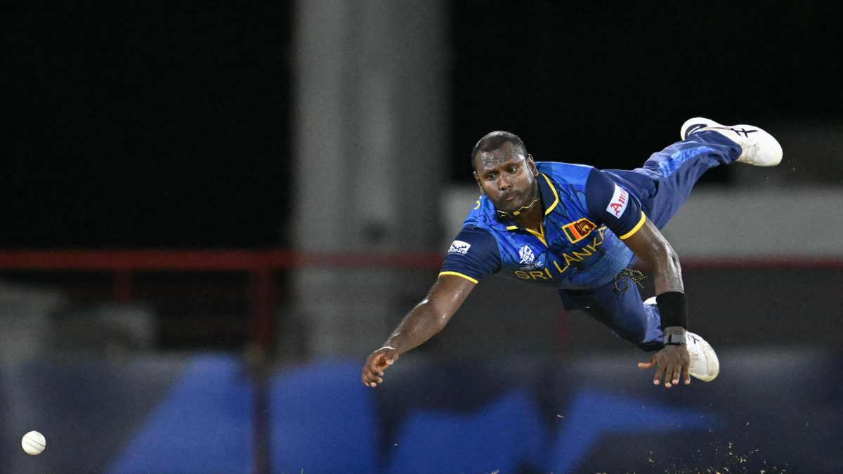 Sri Lanka's Angelo Mathews fails to catch the ball during the ICC men's Twenty20 World Cup 2024 group D cricket match between Sri Lanka and the Netherlands at Daren Sammy Cricket Ground in Gros Islet, St. Lucia, June 16, 2024