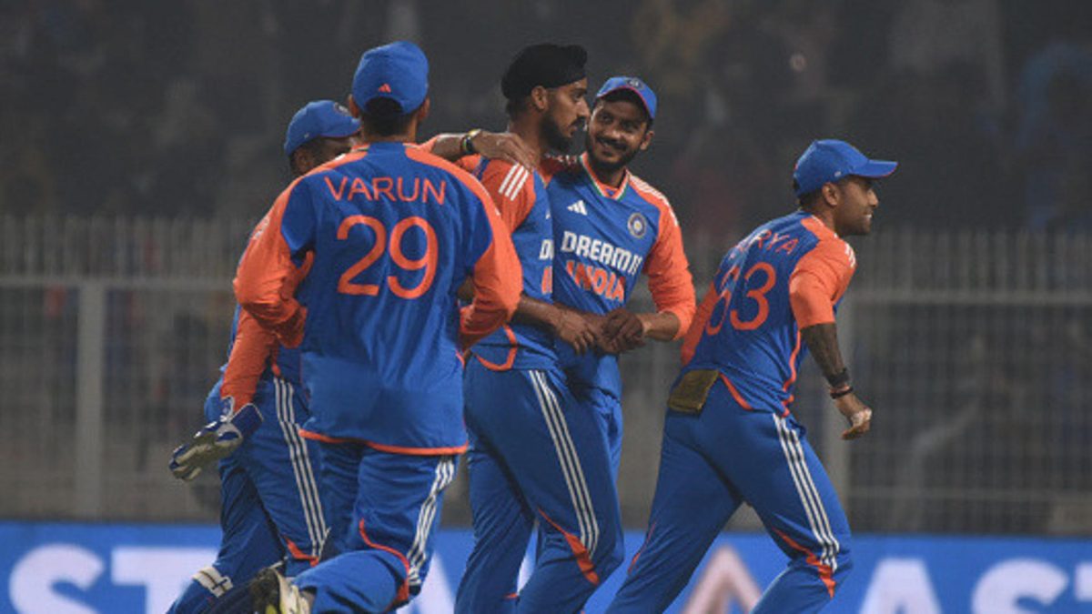 India's Arshdeep Singh, center, celebrates with teammate captain Suryakumar Yadav, right, and others after the dismissal of England's Ben Duckett during the first T20 cricket match between India and England at Eden Gardens in Kolkata, India, on January 22, 2025