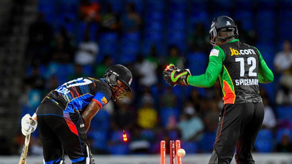 Fabian Allen (L) of Antigua and Barbuda Falcons bowled by Waqar Salamkheil of Saint Kitts and Nevis Patriots during the Men's 2025 Republic Bank Caribbean Premier League match 1 between Saint Kitts and Nevis Patriots and Antigua and Barbuda Falcons at Warner Park Sporting Complex on August 14, 2025 in Basseterre, Saint Kitts and Nevis