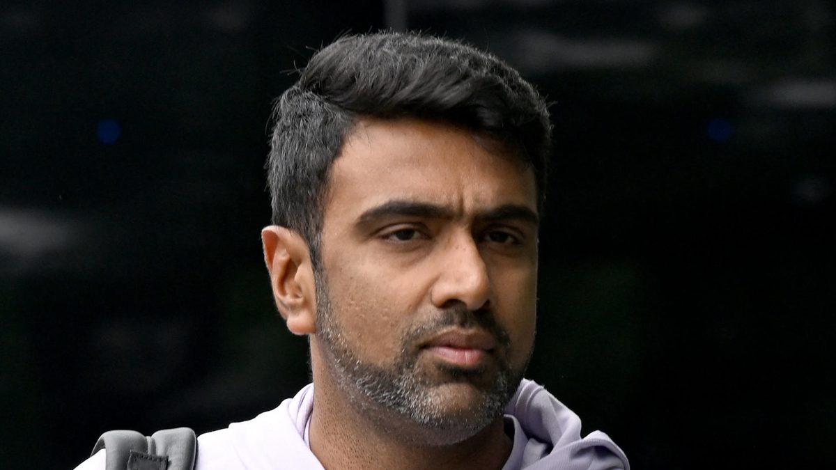 This picture taken on December 1, 2024 shows India's spin bowler Ravichandran Ashwin arriving to attend a cricket warm-up session at Manuka Oval in Canberra. Ashwin announced his immediate retirement from international cricket following the third Test against Australia in Brisbane on December 18, 2024