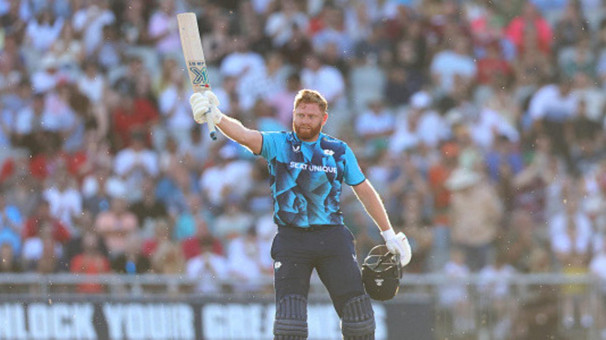 Jonny Bairstow of Yorkshire raises his bat after scoring 100 runs during the Vitality Blast Men between Lancashire Lightning and Yorkshire at Emirates Old Trafford on July 11, 2025 in Manchester, England