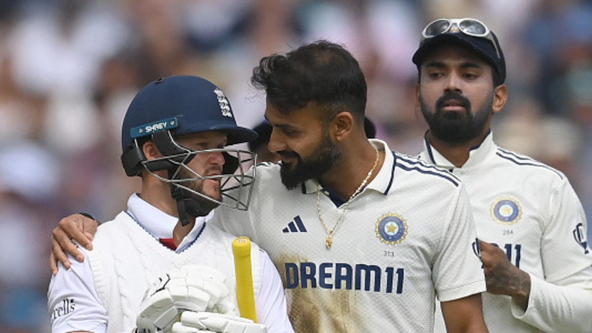 Ben Duckett of England is escorted from the field by Akash Deep after Duckett was caught during the second day of the fifth Rothesay Test Match between England and India at The Kia Oval on August 1, 2025 in London, England