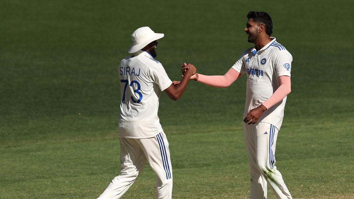 Harshit Rana and Mohammed Siraj of India celebrate the wicket of Alex Carey of Australia and winning the match during day four of the First Test match in the series between Australia and India at Perth Stadium on November 25, 2024 in Perth, Australia