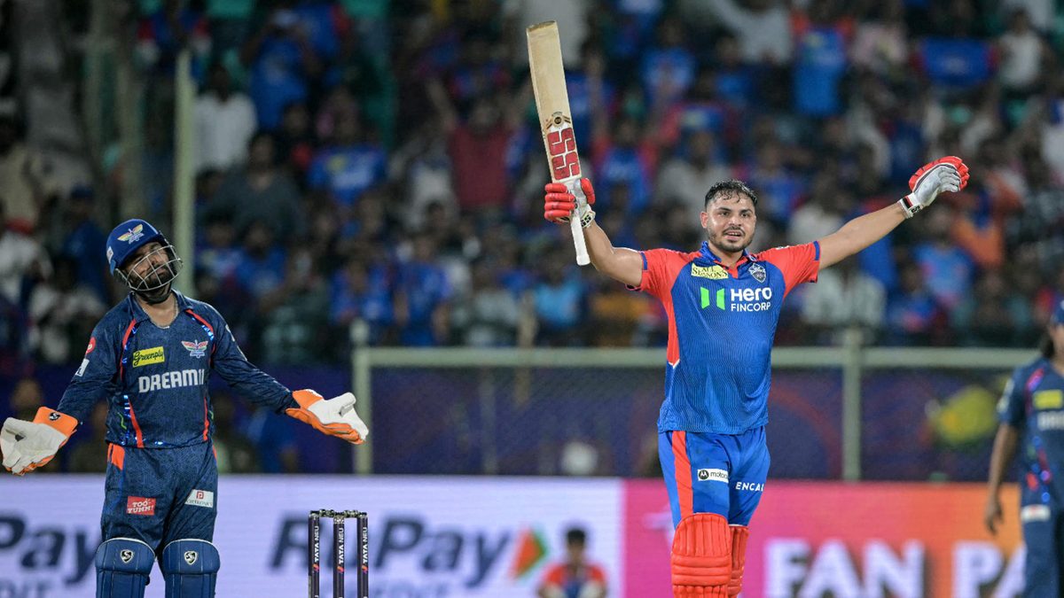 Delhi Capitals' Ashutosh Sharma (C) celebrates his team's win as Lucknow Super Giants' captain Rishabh Pant (L) reacts at the end of the Indian Premier League (IPL) Twenty20 cricket match between Delhi Capitals and Lucknow Super Giants at the Y.S. Rajasekhara Reddy cricket stadium in Visakhapatnam on March 24, 2025