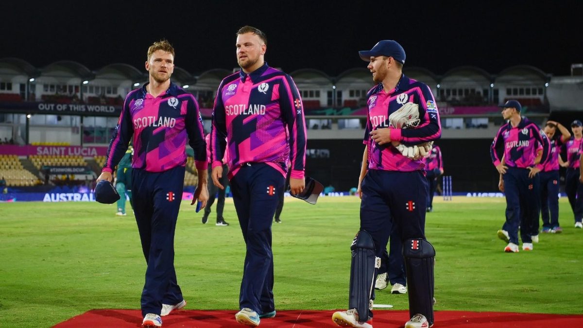 Richie Berrington, Mark Watt and Matthew Cross walk off the field