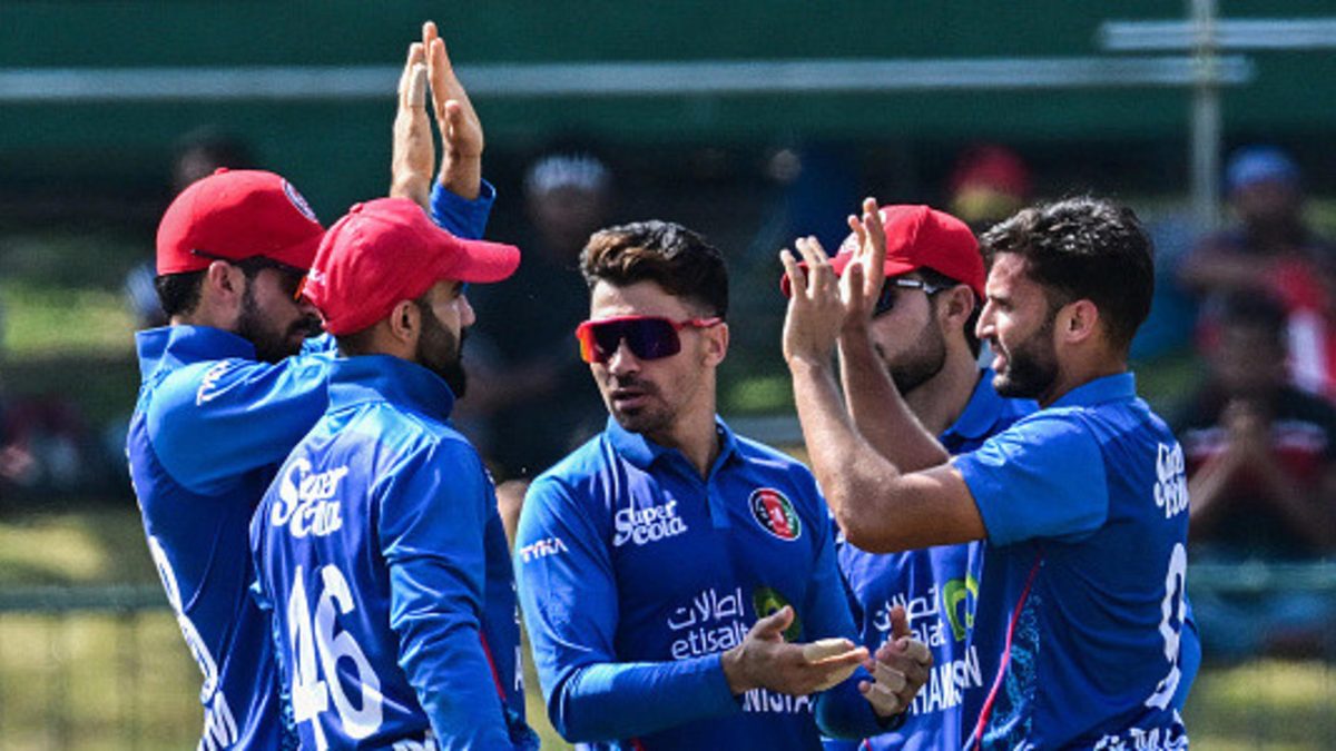 Afghanistan's Azmatullah Omarzai (R) celebrates with teammates after taking the wicket of Sri Lanka's Pathum Nissanka during the second one-day international (ODI) cricket match between Sri Lanka and Afghanistan at the Pallekele International Cricket Stadium in Kandy on February 11, 2024