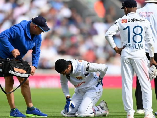 sri-lanka-wicketkeeper-dinesh-chandimal-hobbles-off-after-taking-diving-leg-side-catch.Click to read full article.