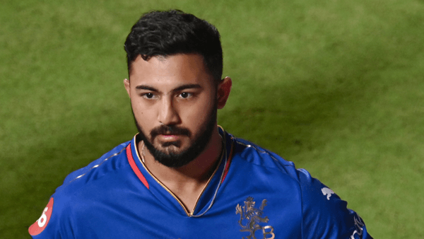 ipl-2024-who-is-rcbs-latest-debutant-saurabh-chauhan-the-son-of-a-groundsman.Click to read full article.