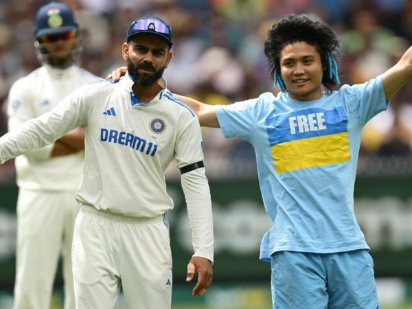 watch-spectator-breaches-security-walks-with-arm-around-virat-kohli-at-mcg.Click to read full article.