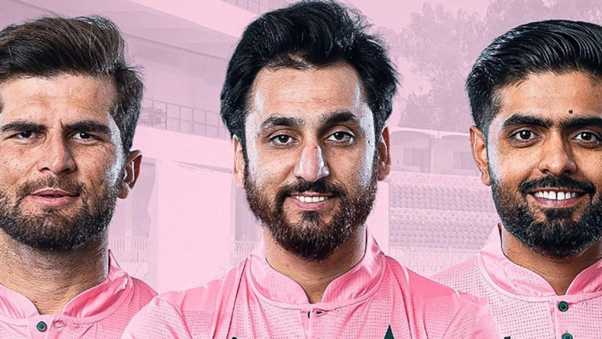 Pakistan players pose with pink jersey