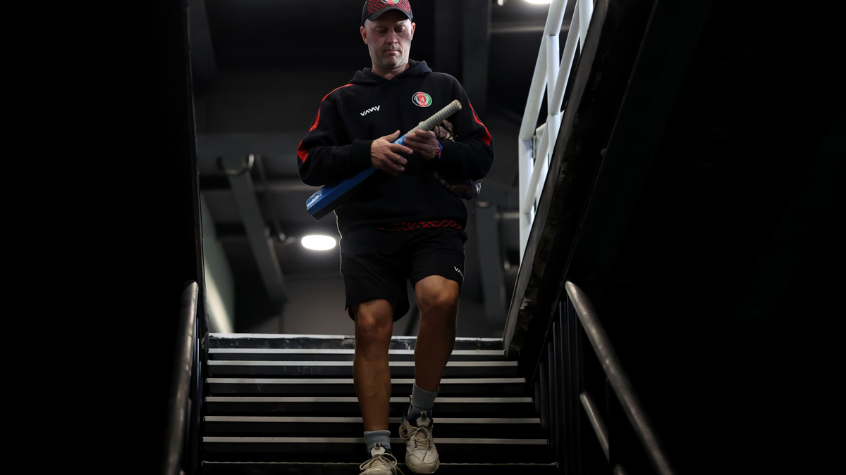 Trott walks back to the dressing room