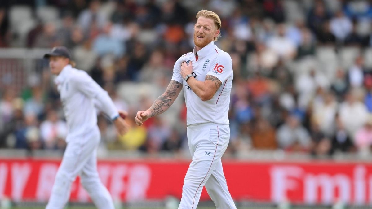 Ben Stokes holds his chest after bowling on day five against India in Manchester