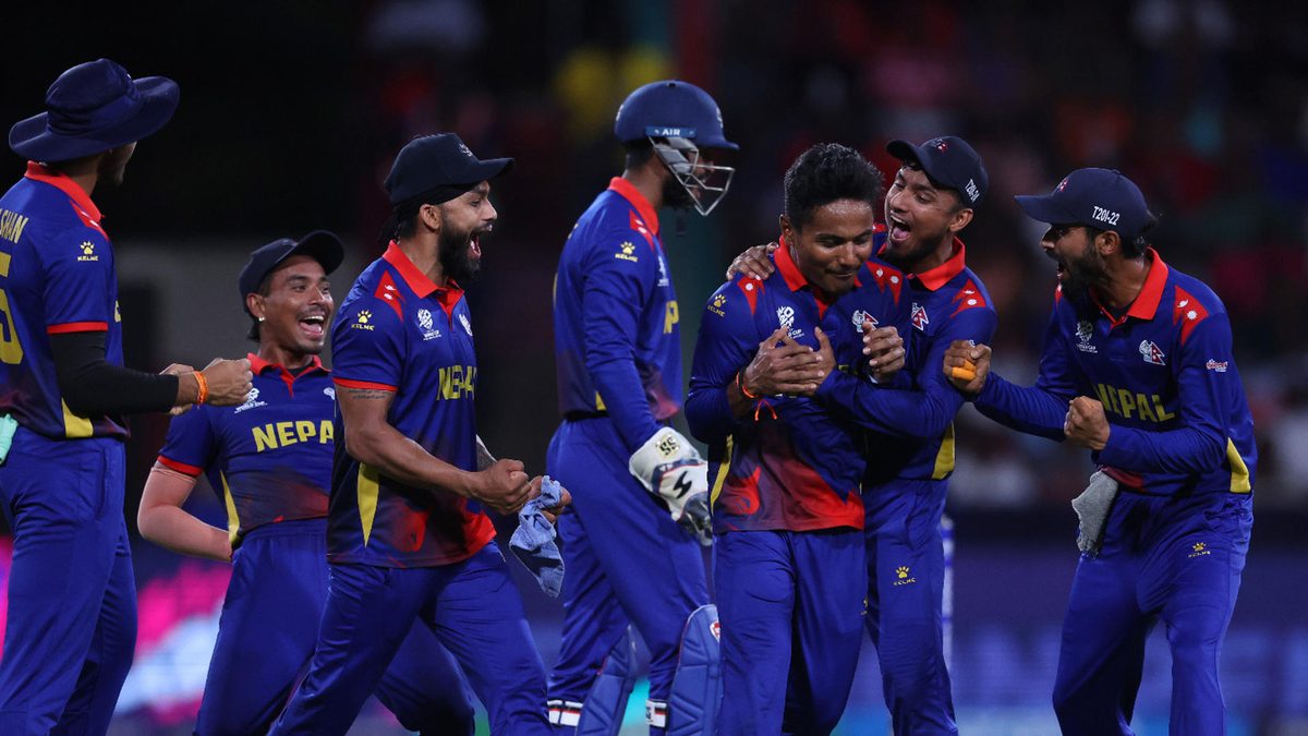 Rohit Paudel of Nepal celebrates with teammates after dismissing Shakib Al Hasan of Bangladesh (not pictured) LBW after a DRS review during the ICC Men's T20 Cricket World Cup West Indies & USA 2024 match between Bangladesh and Nepal at Arnos Vale Ground on June 16, 2024 in St Vincent, Saint Vincent and The Grenadines