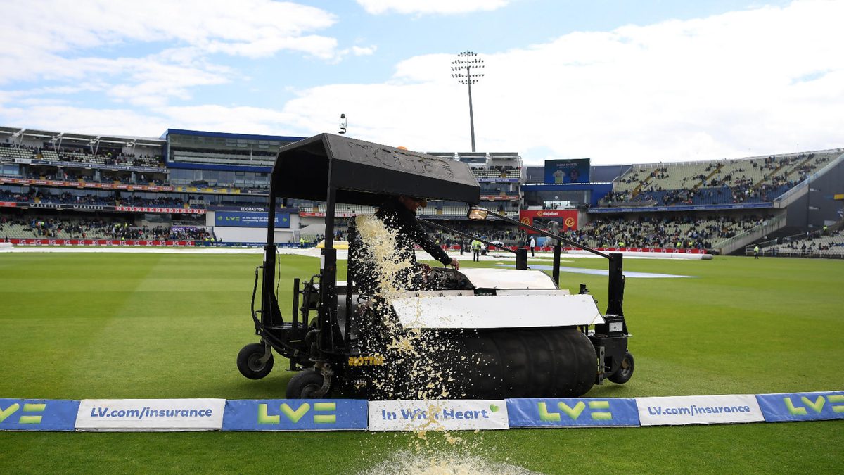 A member of the groundstaff takes water off the pitch as play is delayed due to rain on Day Two of the Fifth LV= Insurance Test Match at Edgbaston on July 02, 2022 in Birmingham, England