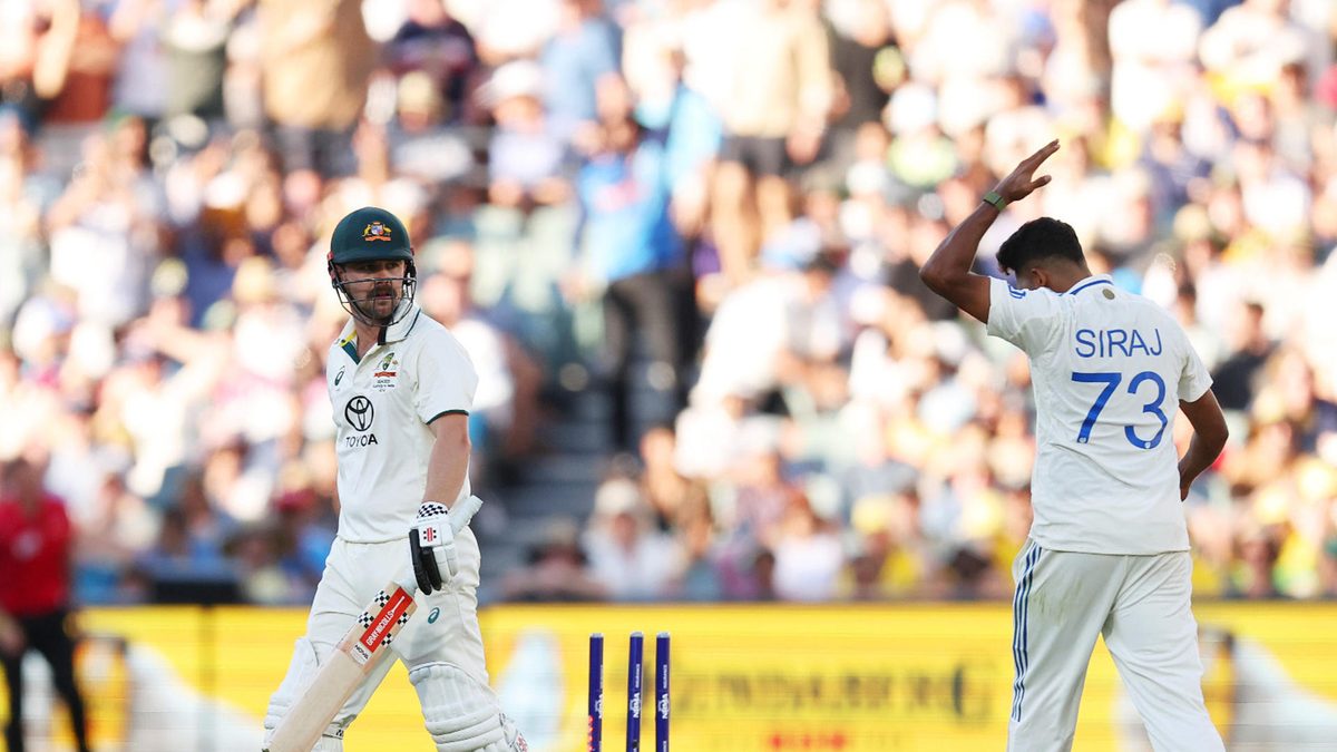 Mohammed Siraj of India celebrates towards Travis Head of Australia as he leaves the field after being bowled during day two of the Men's Test Match series between Australia and India at Adelaide Oval on December 07, 2024 in Adelaide, Australia