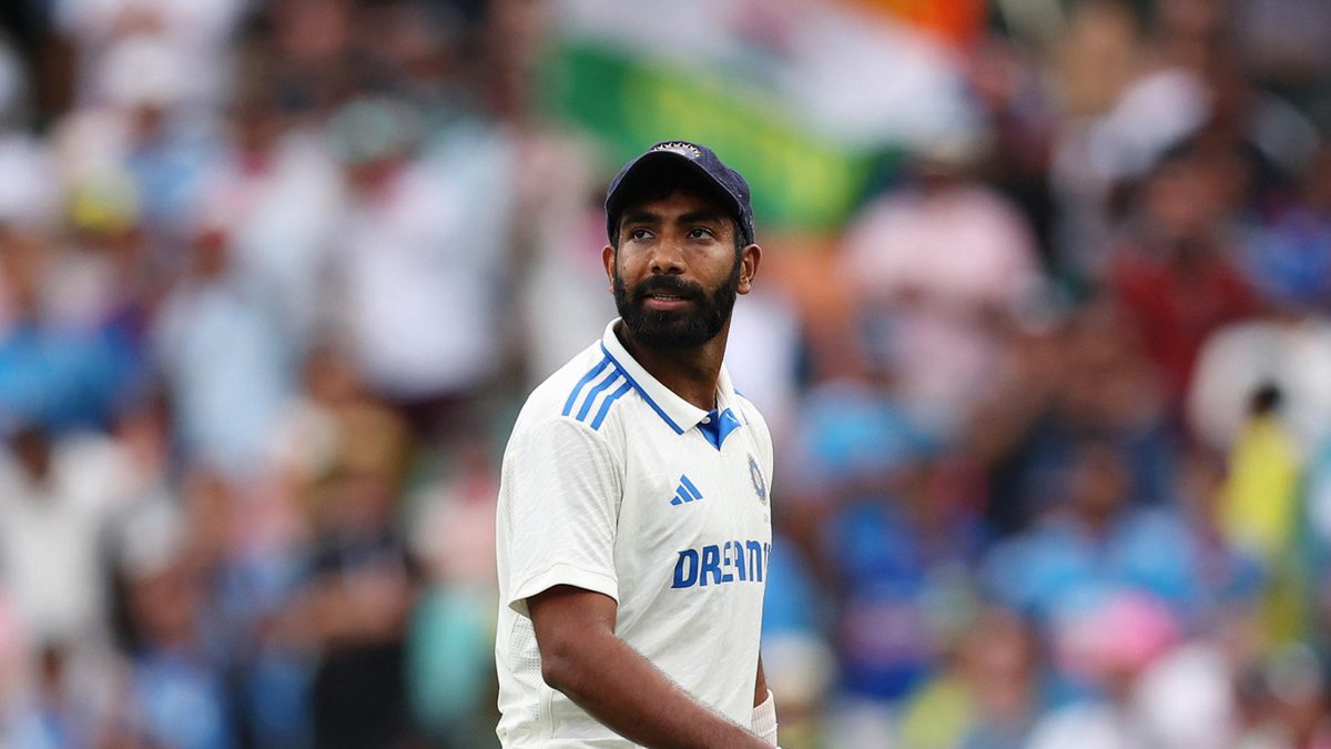 Jasprit Bumrah of India walks off the field with teammates following the end of play on day one of the Fifth Men's Test Match in the series between Australia and India at Sydney Cricket Ground on January 03, 2025 in Sydney, Australia