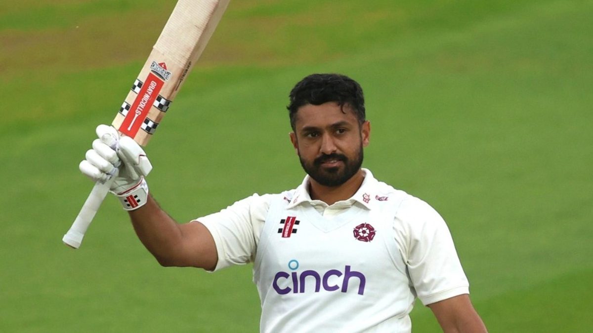 Karun Nair of Northamptonshire celebrates reaching his century in the County Championship