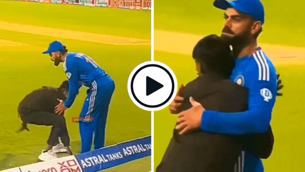 watch-pitch-invader-embraces-virat-kohli-before-being-hauled-away-by-security.Click to read full article.