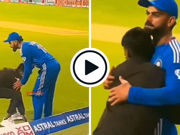 watch-pitch-invader-embraces-virat-kohli-before-being-hauled-away-by-security.Click to read full article.