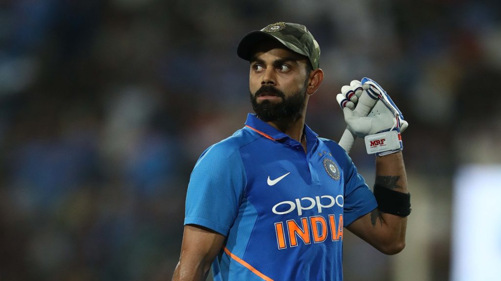 Virat Kohli led out an Indian team donned in camouflage caps