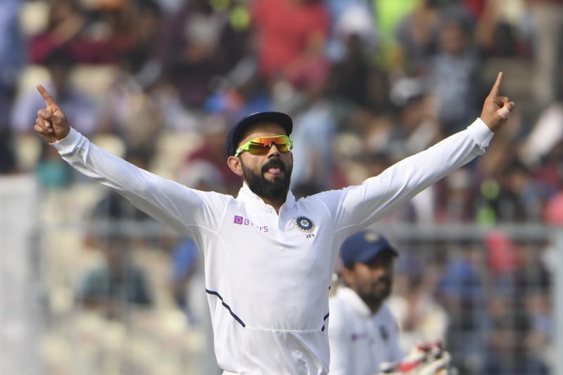Captain Kohli celebrates as India win their maiden day/night Test against Bangladesh