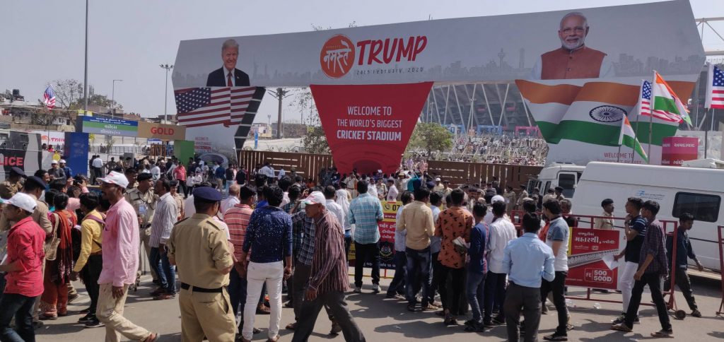 The Motera Stadium entrance, with photos of Trump and Modi book-ending the gates